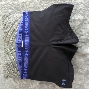 Under Armour black athletic shorts with purple band Size L